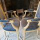 Pair of Louis XVI cabriolet armchairs in cream and blue French elegance late 19th century