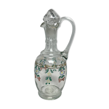 Enameled glass carafe with flower decoration circa 1900