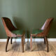 Pair of green leather gondola chairs Art Deco by De Coen