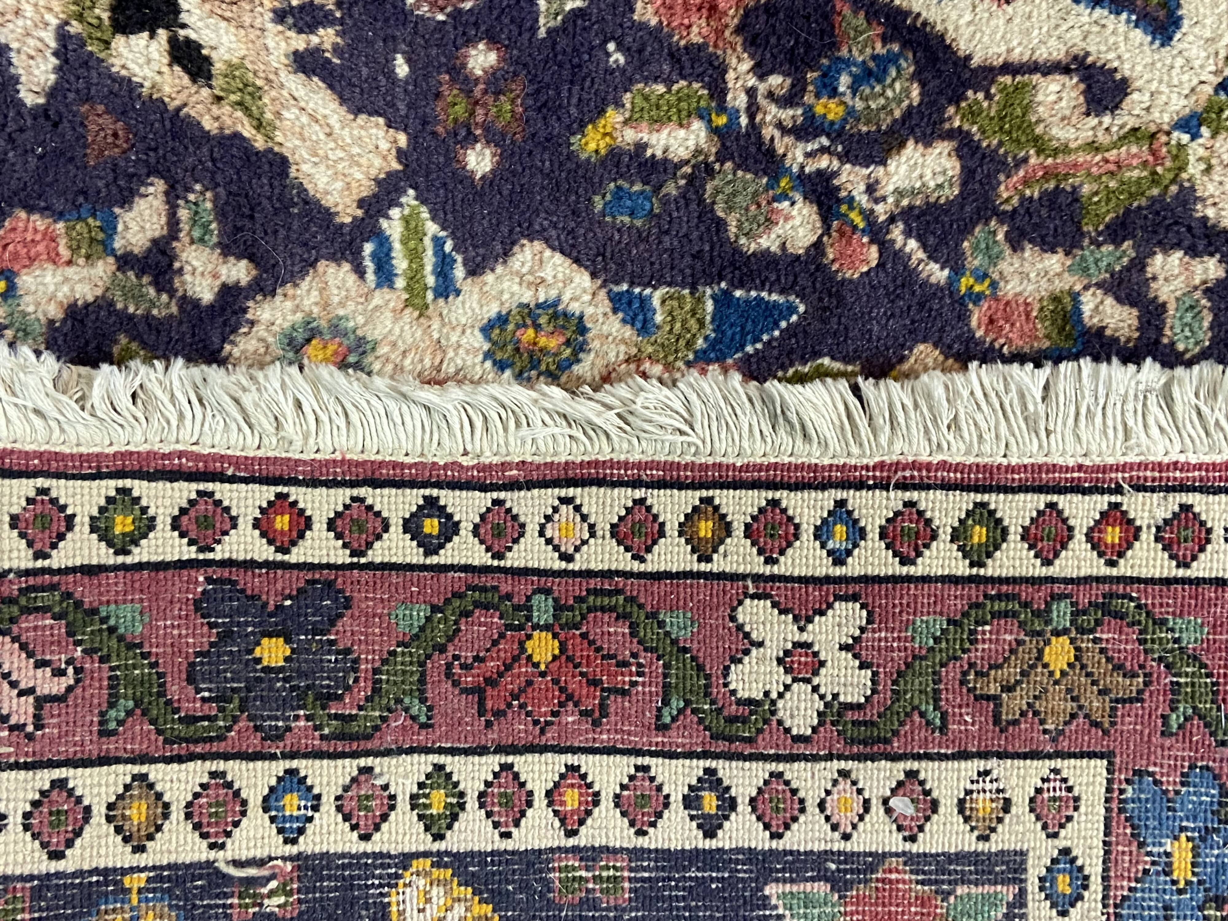 Antique Oriental rug from a nomadic tribe, 1950-1980, birds on a purple background