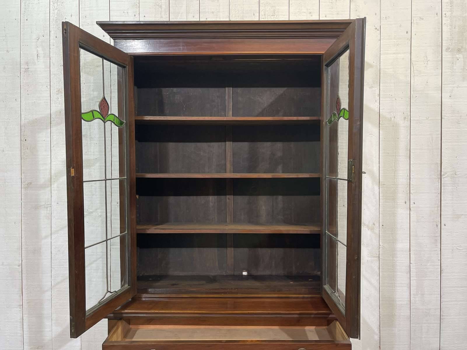 Early 20th century English two-section mahogany bookcase