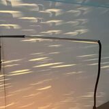 Mid-century modern Danish extendable cantilever wall lamp with a rattan shade, 1960s.