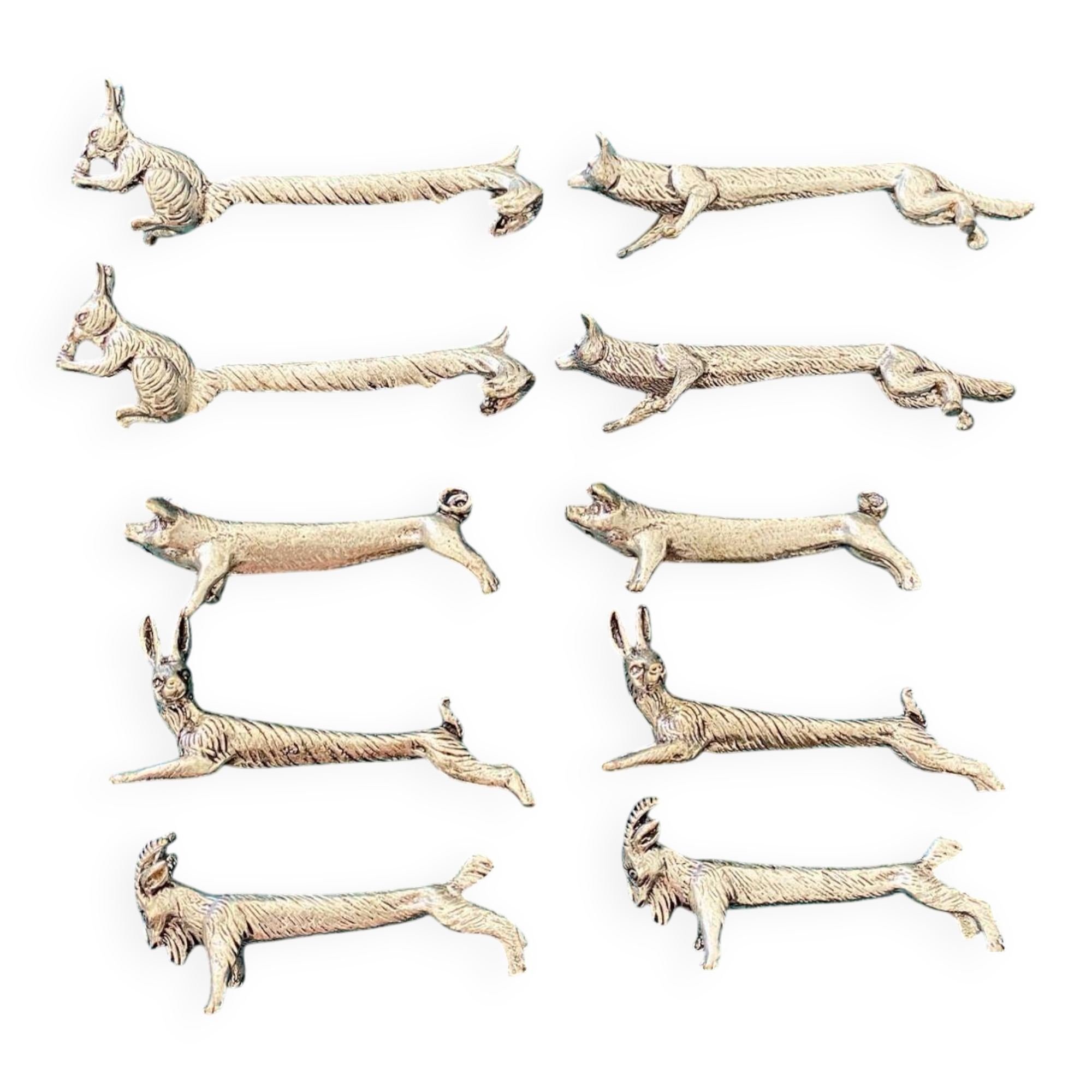 10 animal-shaped knife holders in silver-colored metal