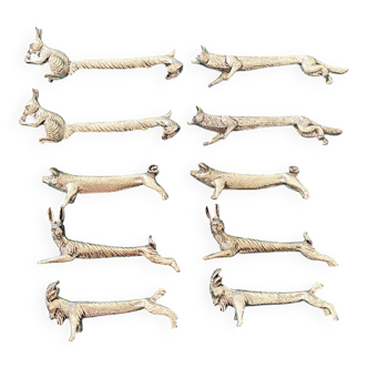 10 animal-shaped knife holders in silver-colored metal