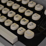 Brother typewriter with his binder - 1960s