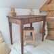 Old farmhouse side table in country style
