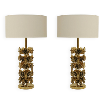 Mid-century modern Italian table lamps with hand-sculpted brass, floral pattern.