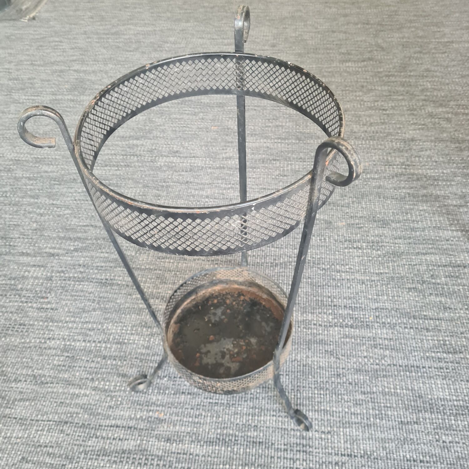 Wrought iron umbrella holder