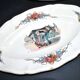 Sarreguemines sauce boat and dish in earthenware with "Obernai" decoration by Henri Loux