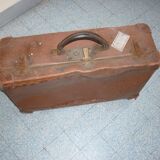 Unica red-haired suitcase