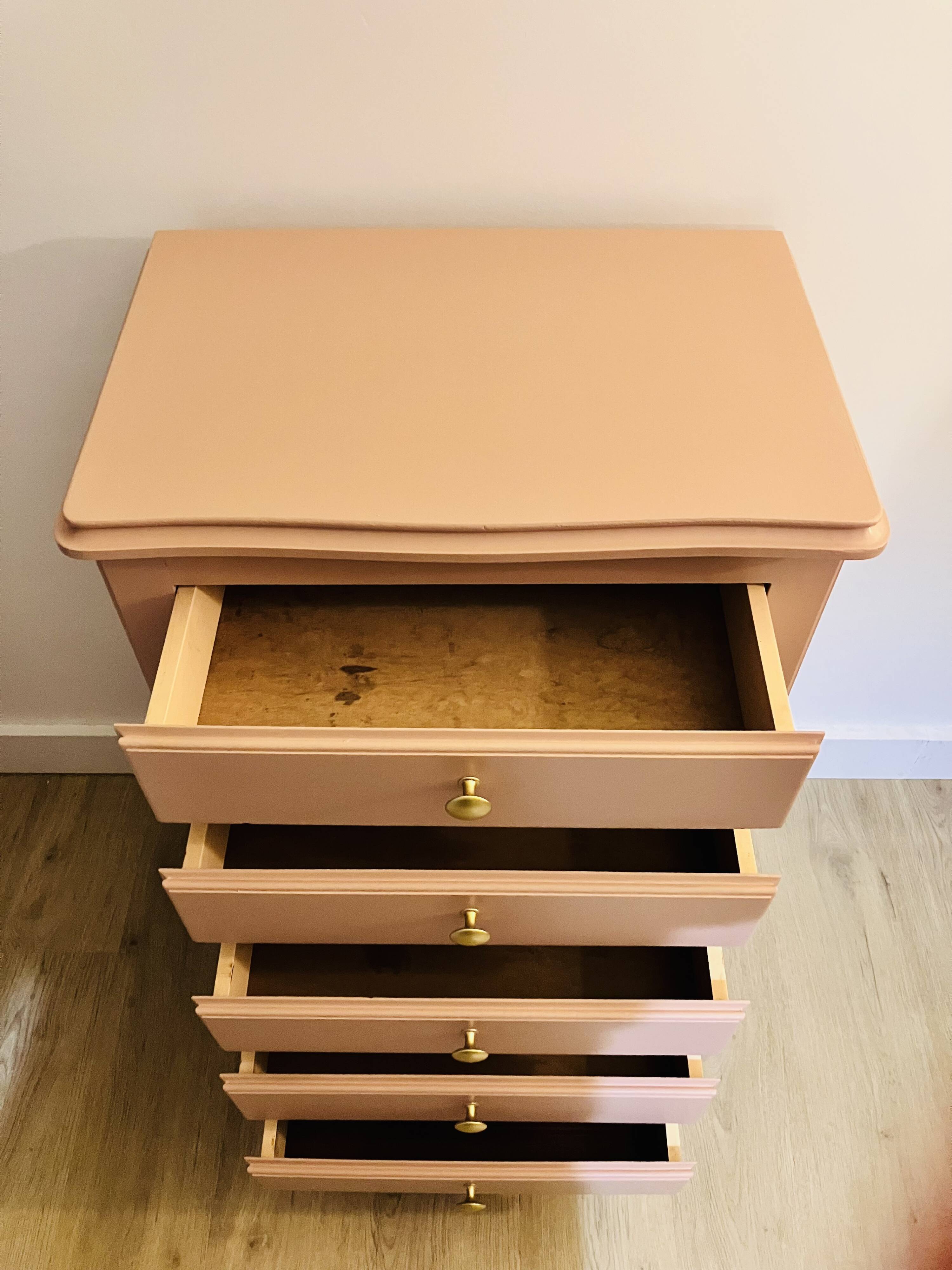 Pink wooden chest of drawers