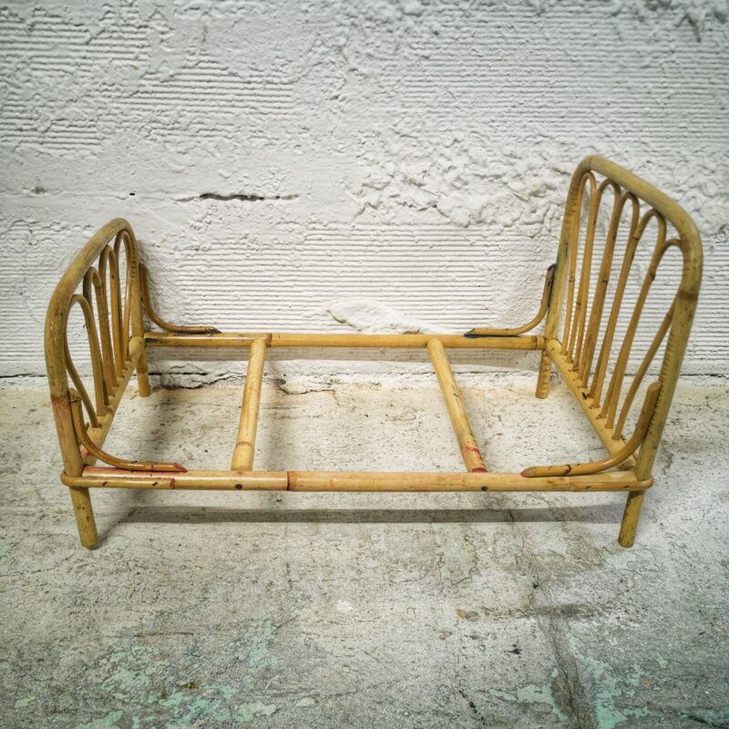 Rattan doll bed