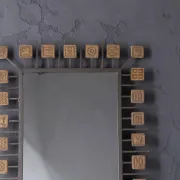 Rectangular brutalist mirror in wrought iron and terracotta tiles.
