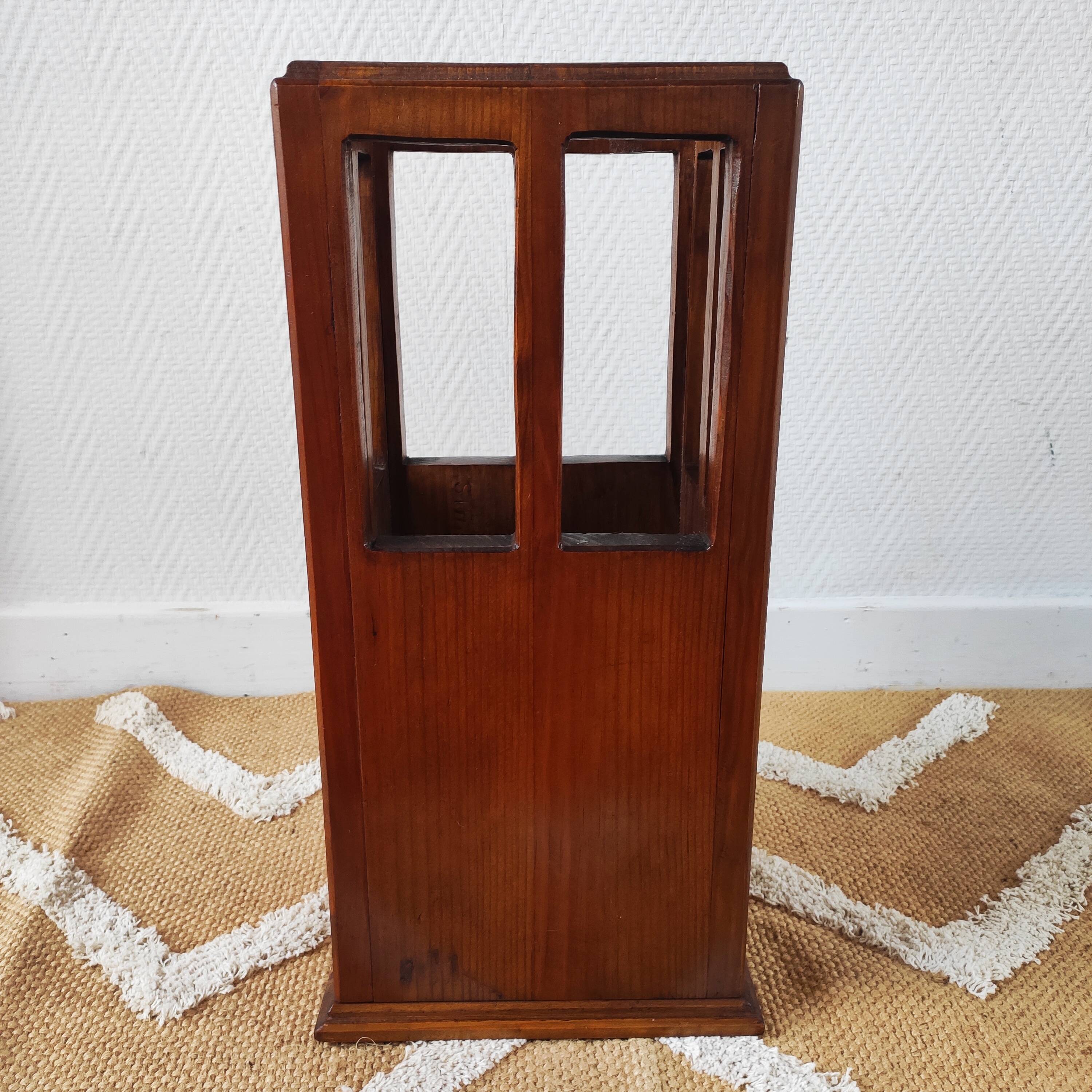 Vintage brutalist umbrella stand made of solid wood.