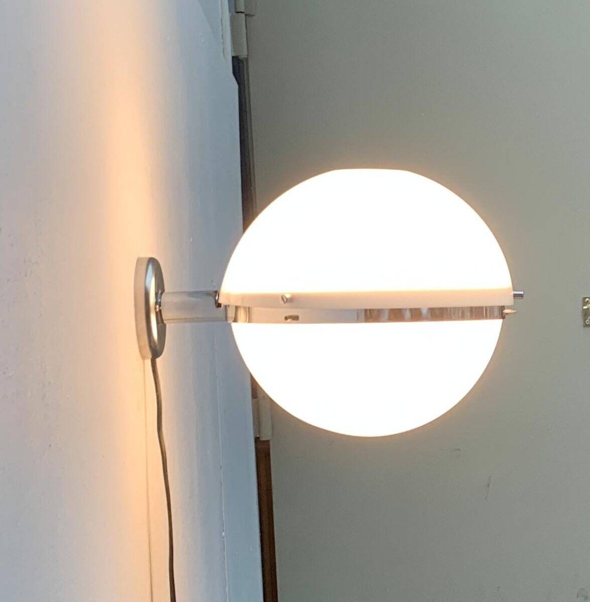 Mid-century Italian space age spherical wall light by Guzzini.