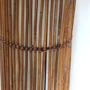 Mid-century rattan floor lamp, in the style of Louis Sognot.