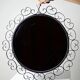 Vintage round wall mirror from the 60s and 70s, wrought iron arabesques
