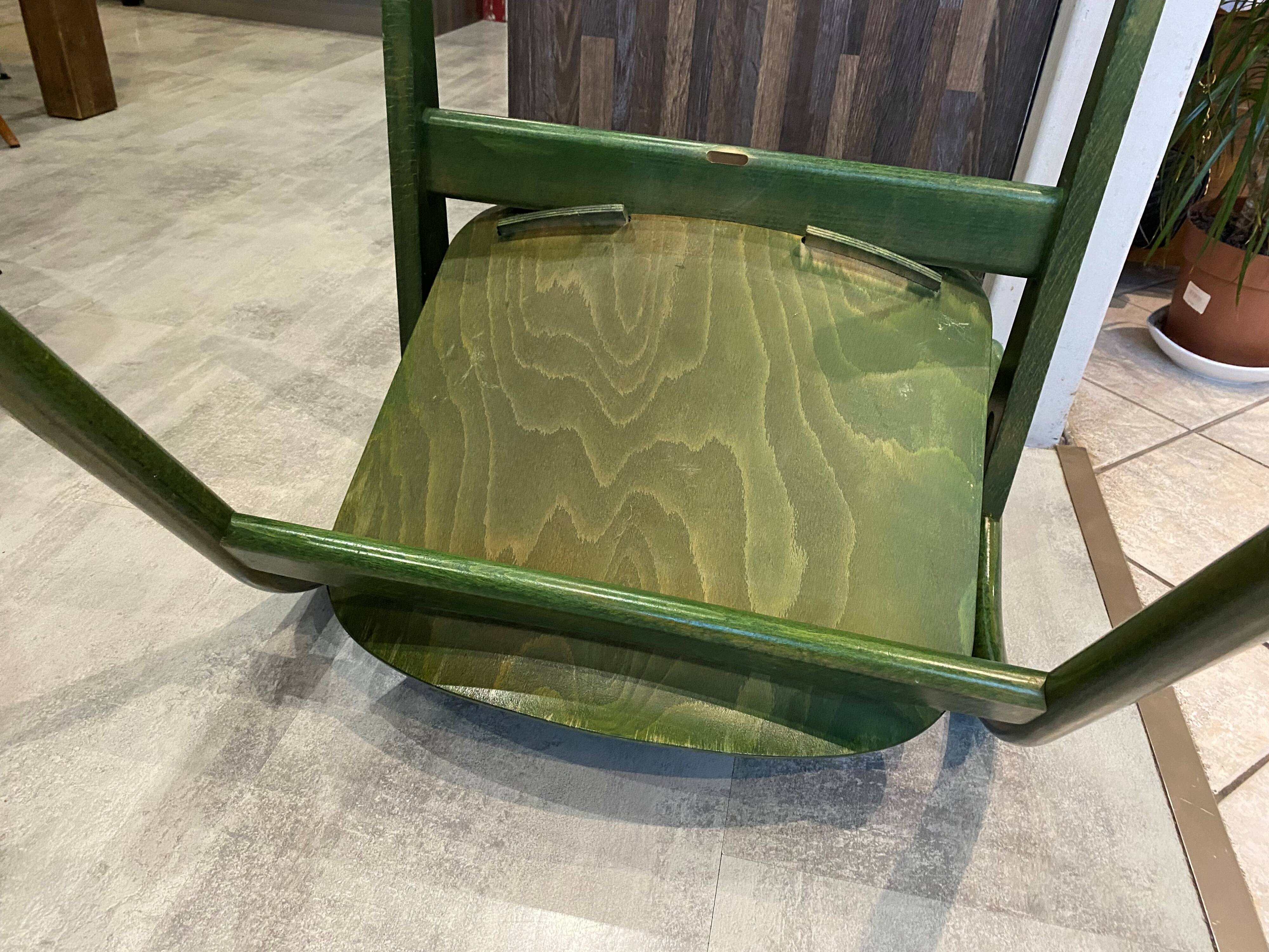 Fauteuil Baumann vert, années 70