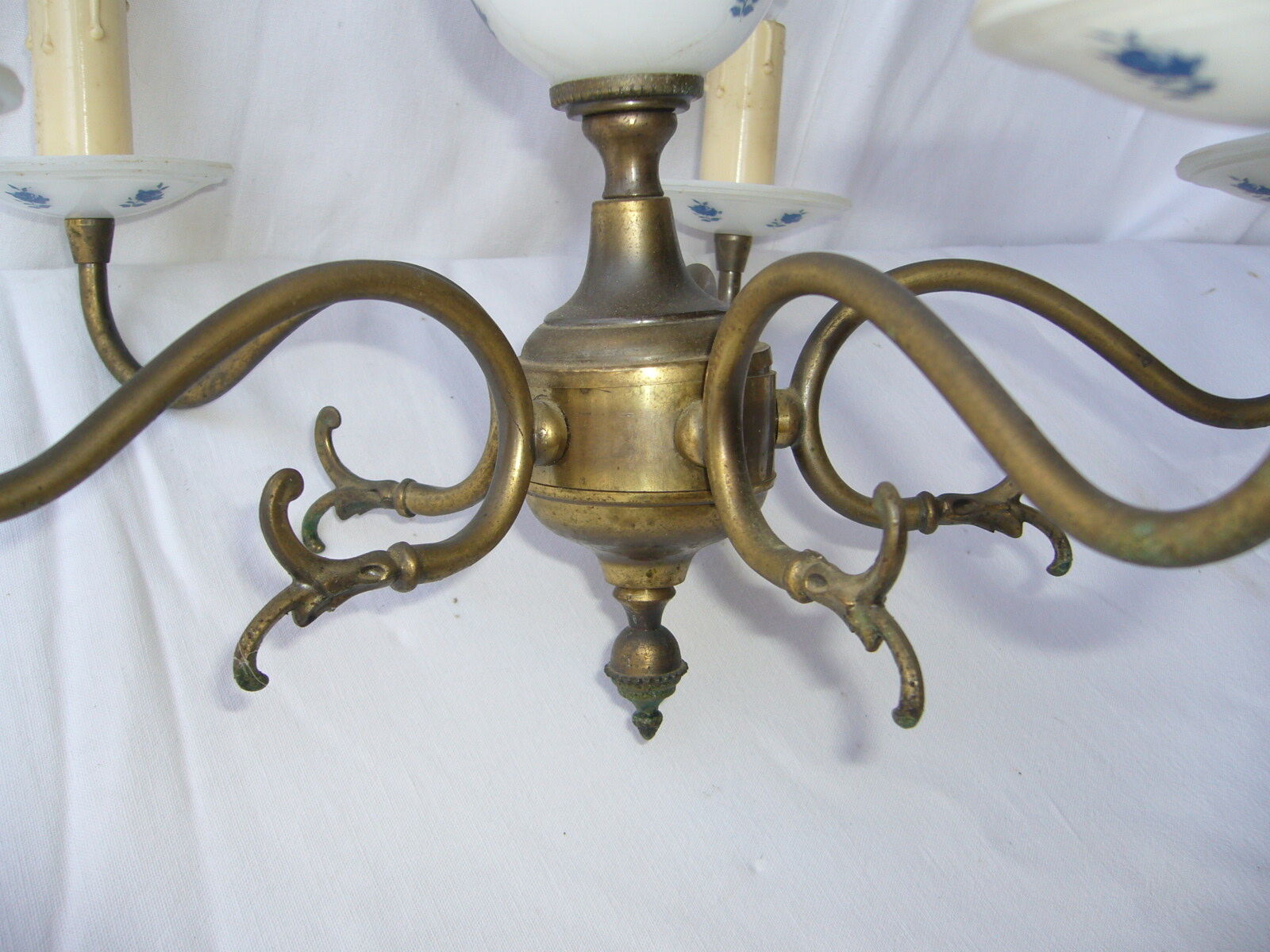 Brass chandelier and Dutch-style earthenware. Vintage