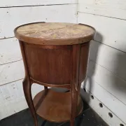 Oval bedside table in Louis XV style made of mahogany.