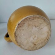 Glazed earthenware jug