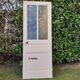 Eight old communication doors, solid and glazed, made of solid wood.