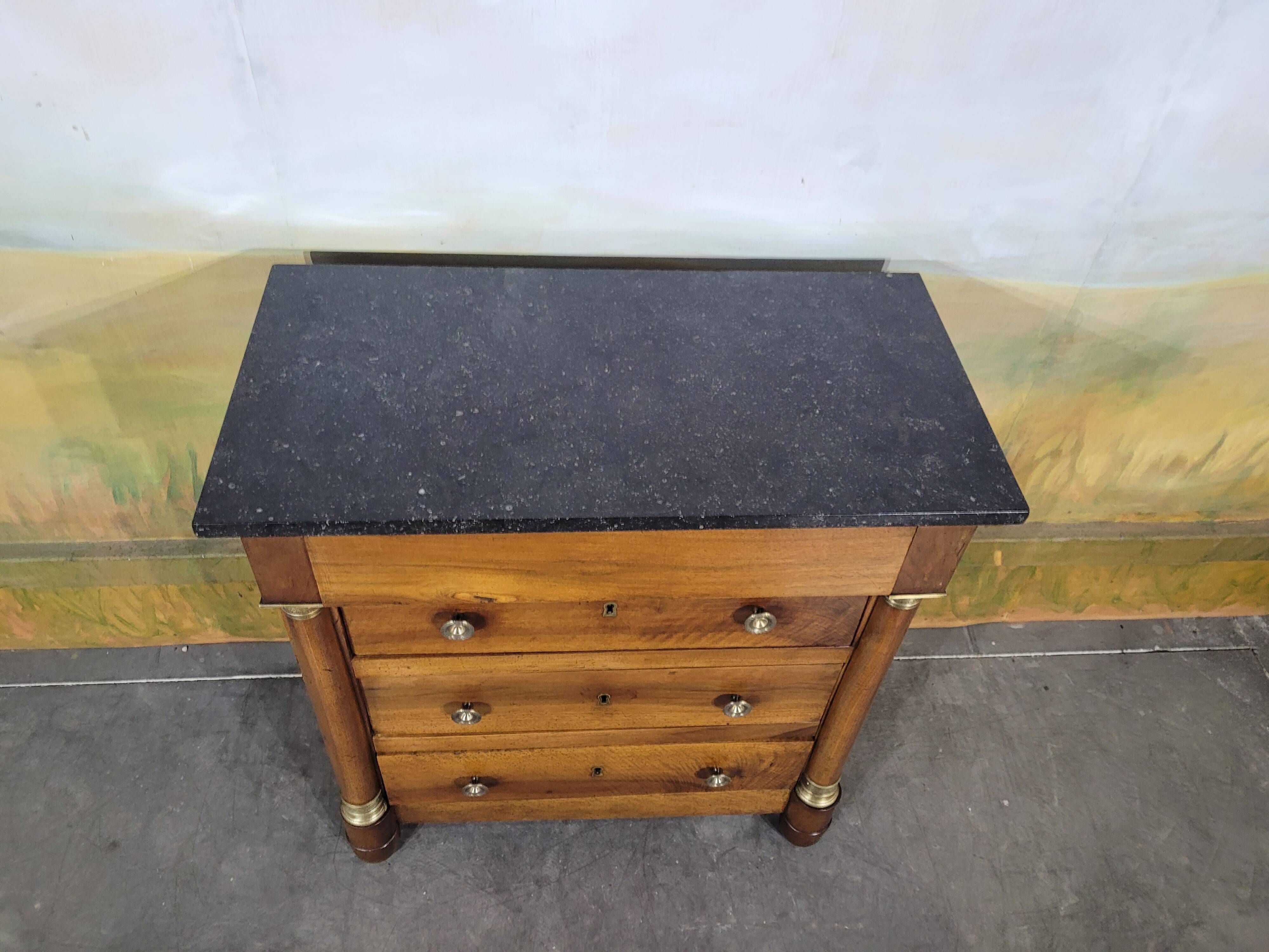 Small Empire-style chest of drawers in solid walnut