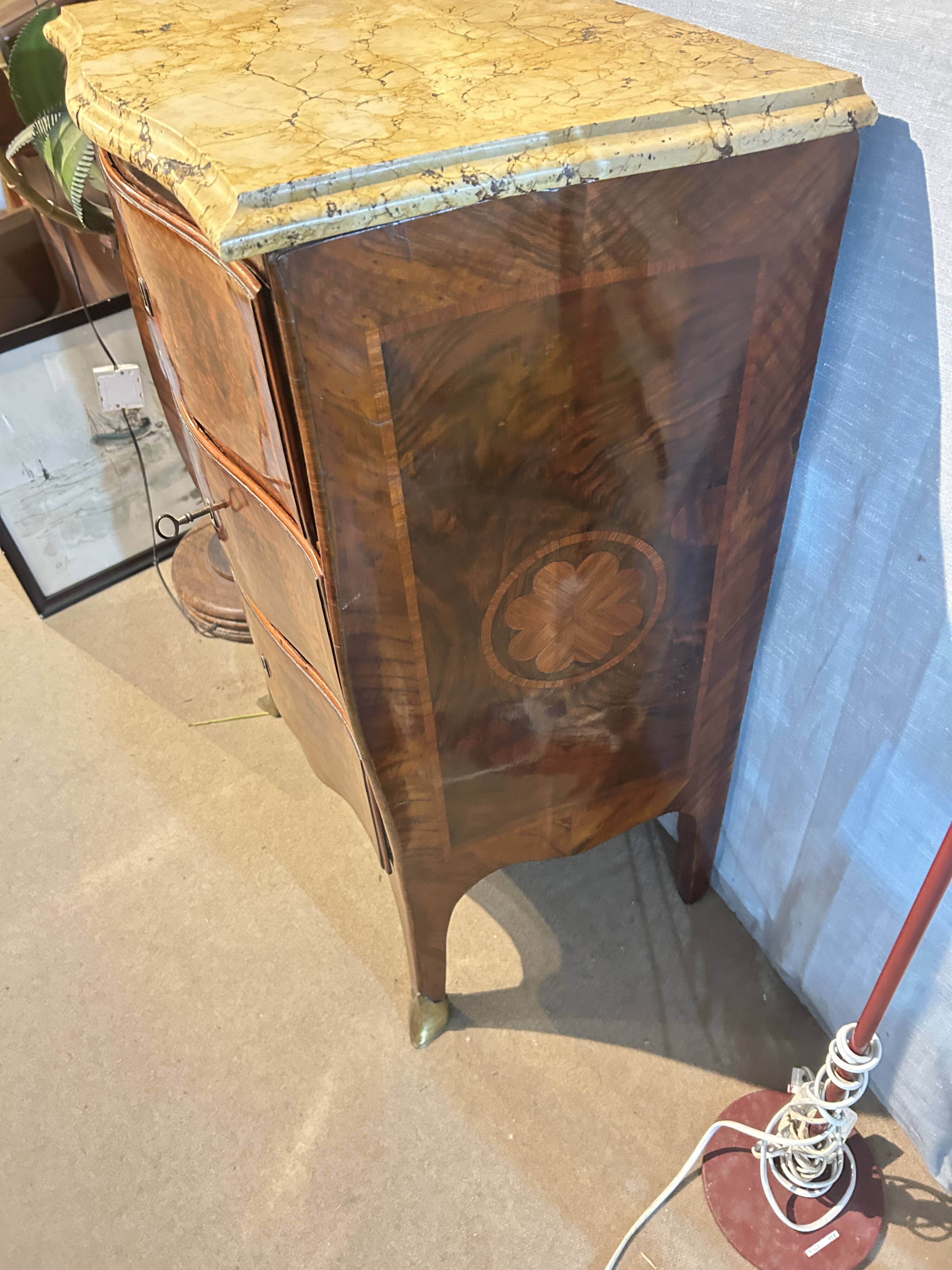 Louis XV marquetry commode, curved.