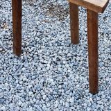 Pair of shepherd's stools in tripod oak décor in the heart