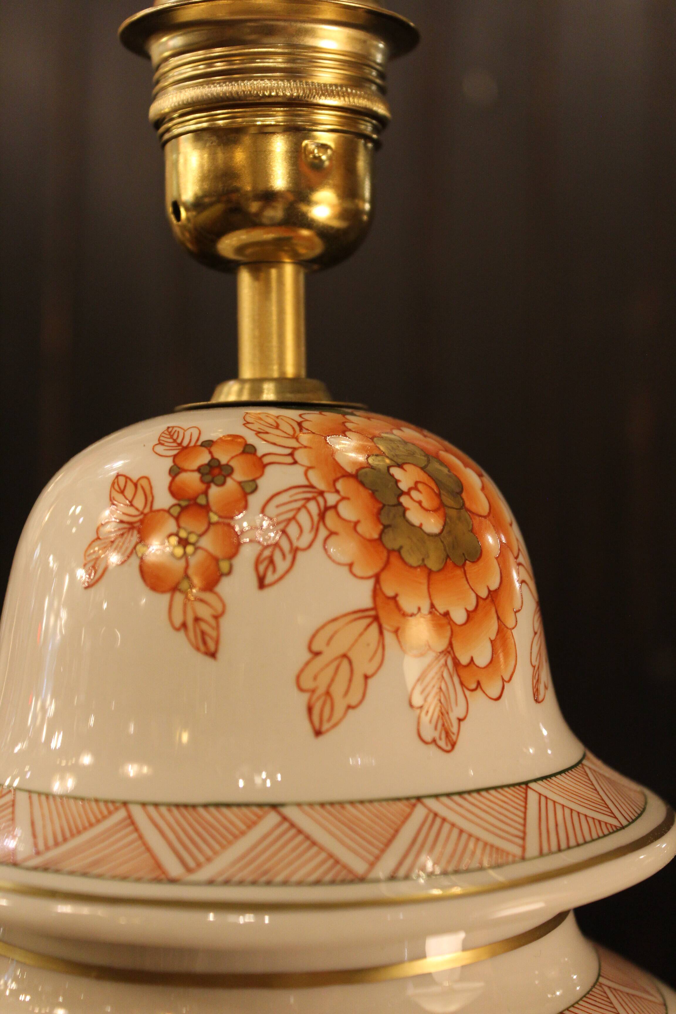 Spanish porcelain lamp hand-painted with floral patterns.