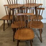 Set of 8 vintage chairs with bars and compass legs 1960