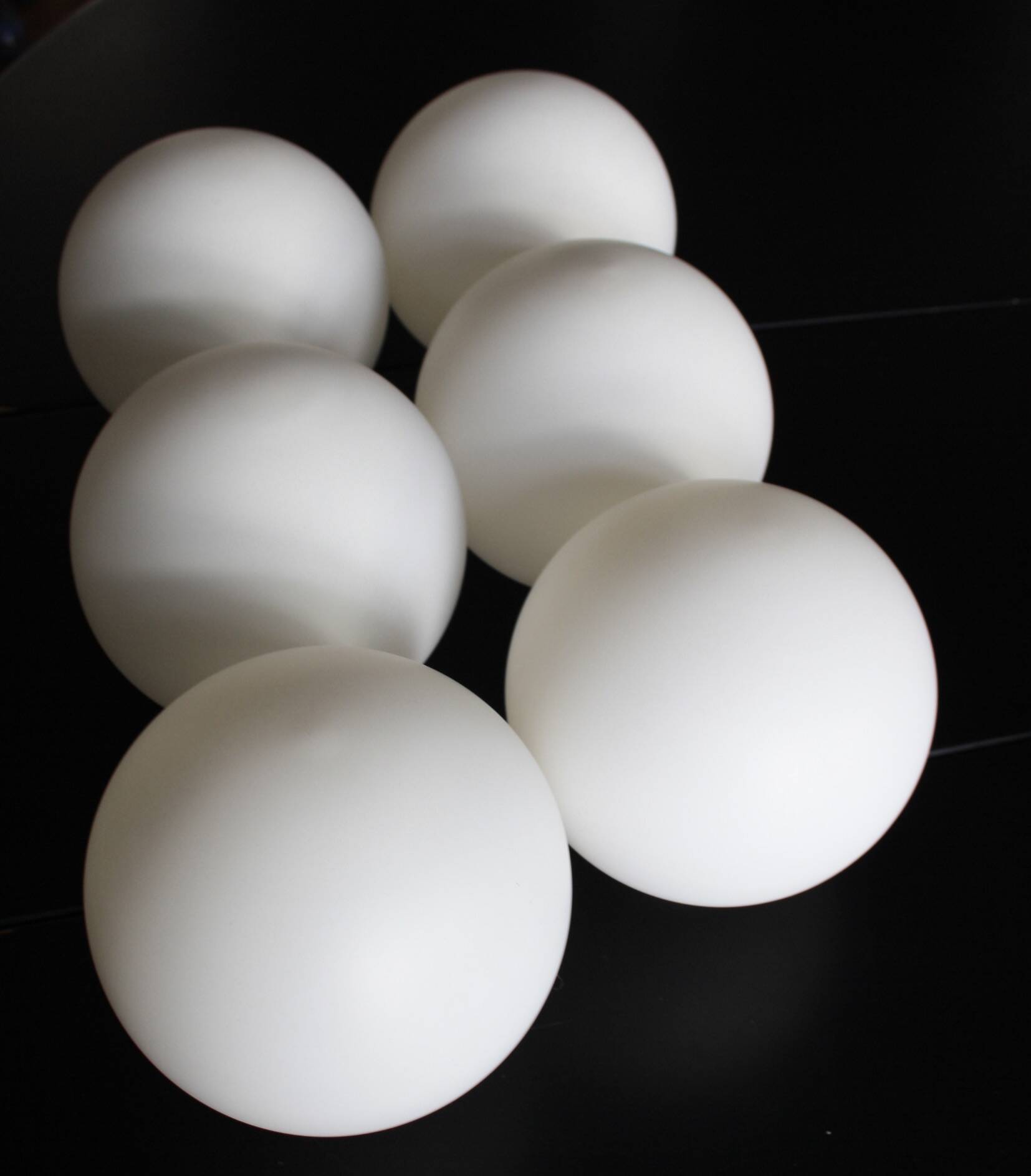 Metal chandelier and glass globes