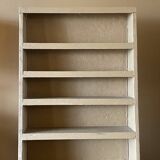 Painted wooden display shelf with an incline