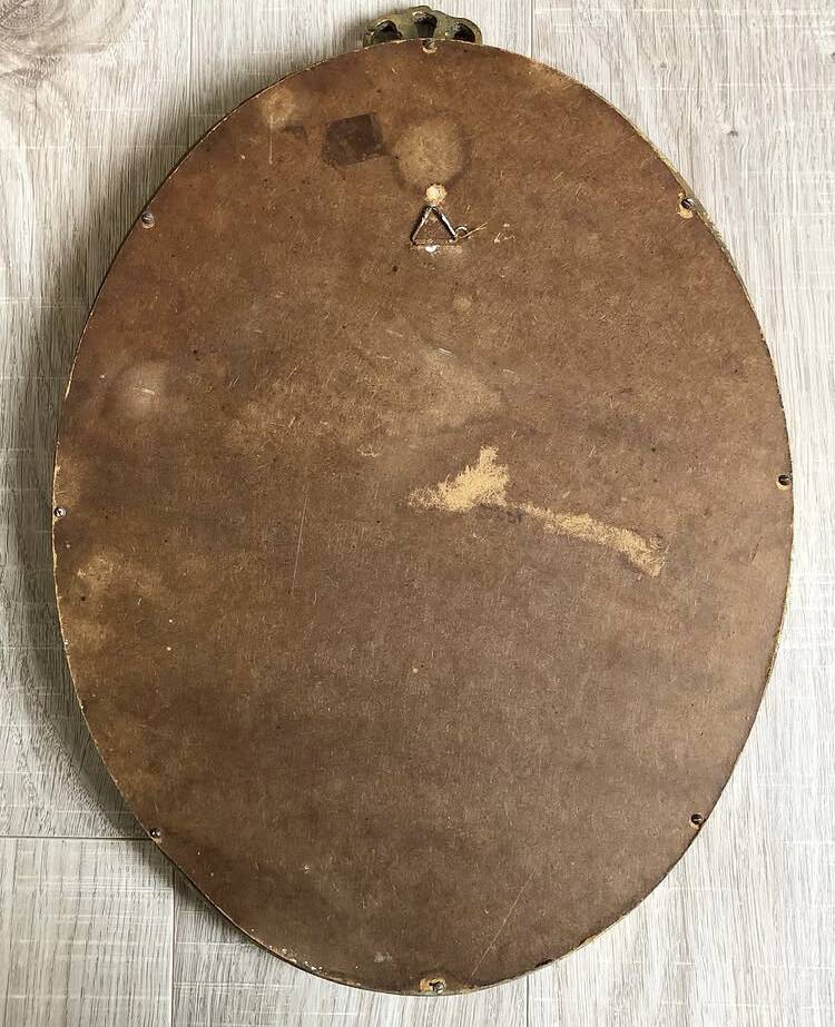 Large vintage oval mirror