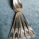 Six small Christofle model Marly spoons in silver metal