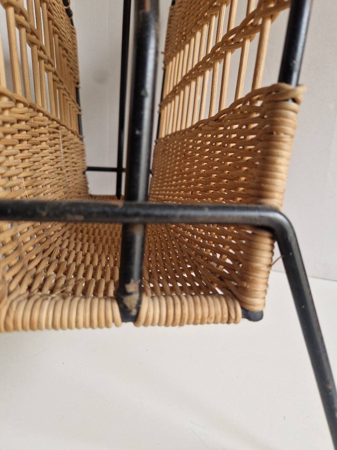 Raoul Guys magazine rack 1950s  
Rattan and black metal