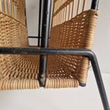 Raoul Guys magazine rack 1950s  
Rattan and black metal