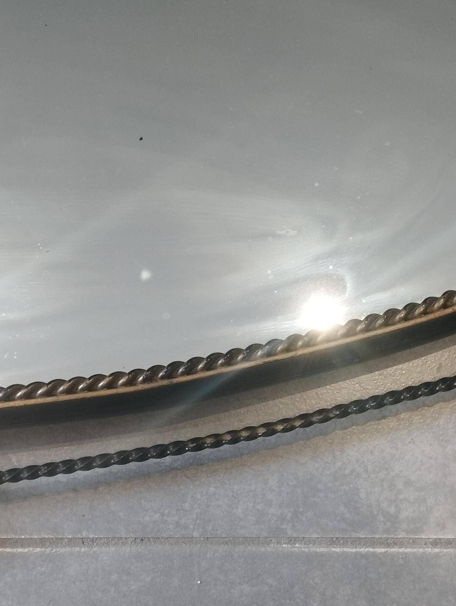 Mid-century modern iron mirror, brutalist, vintage organic, thick sixties.