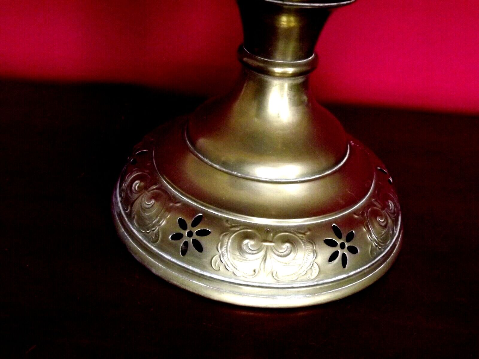 Vintage brass oil lantern with decorative base and transparent glass funnel stamped L B Brand Delay 4399.