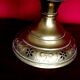 Vintage brass oil lantern with decorative base and transparent glass funnel stamped L B Brand Delay 4399.