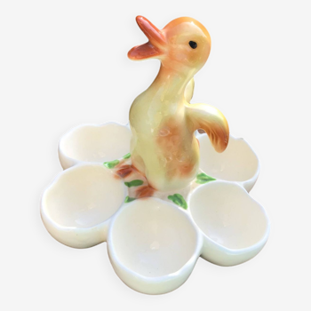Egg cup with central chick decoration