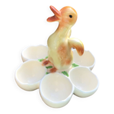 Egg cup with central chick decoration