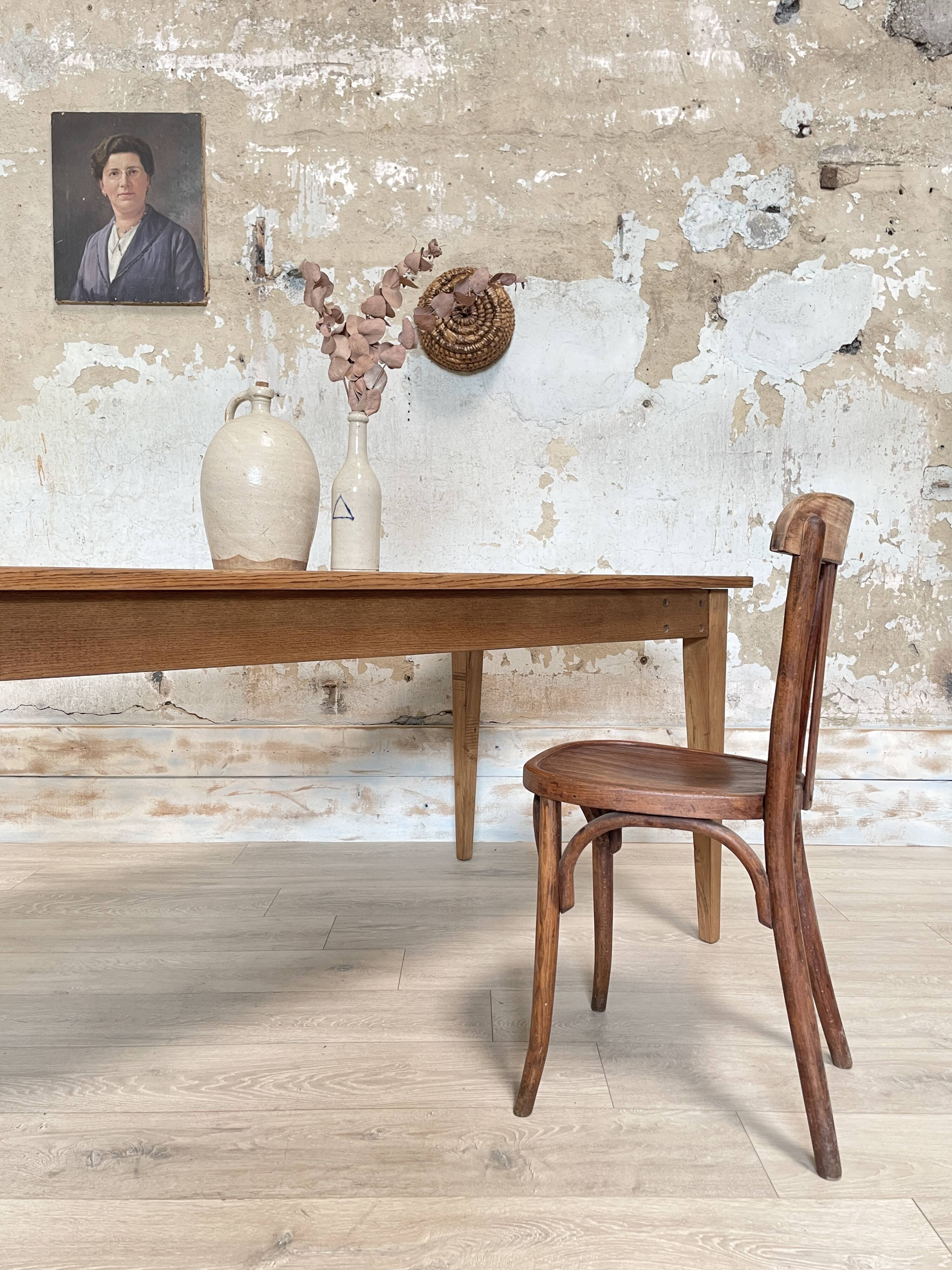 Vintage farm table with spindle legs.