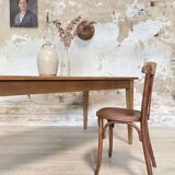 Vintage farm table with spindle legs.