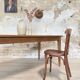 Vintage farm table with spindle legs.