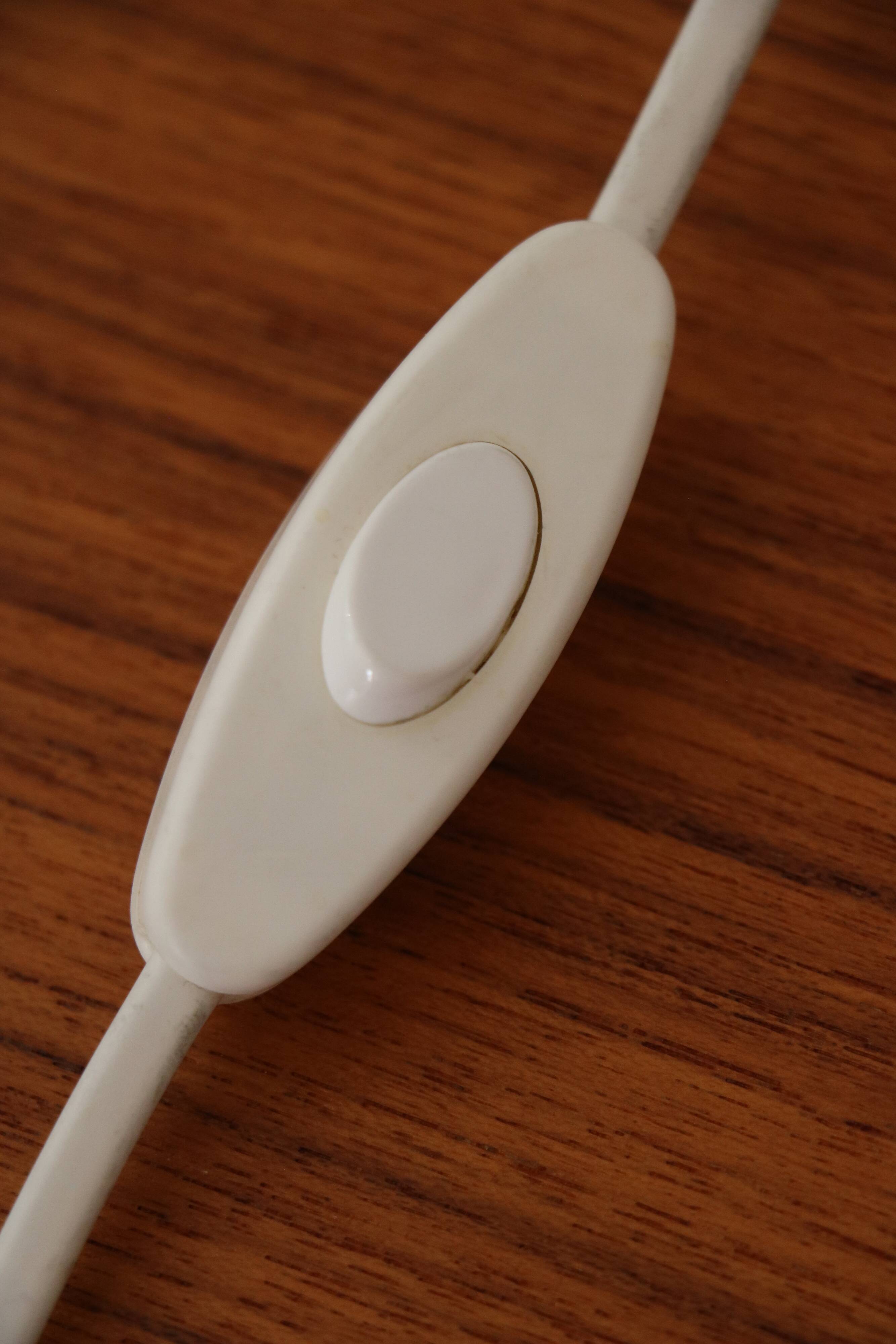 Pair of Scandinavian wall lights in white metal and gold metal