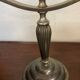 Pair of art deco style candle holders in silver metal