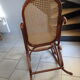 Rocking-chair in turned wood and cannage