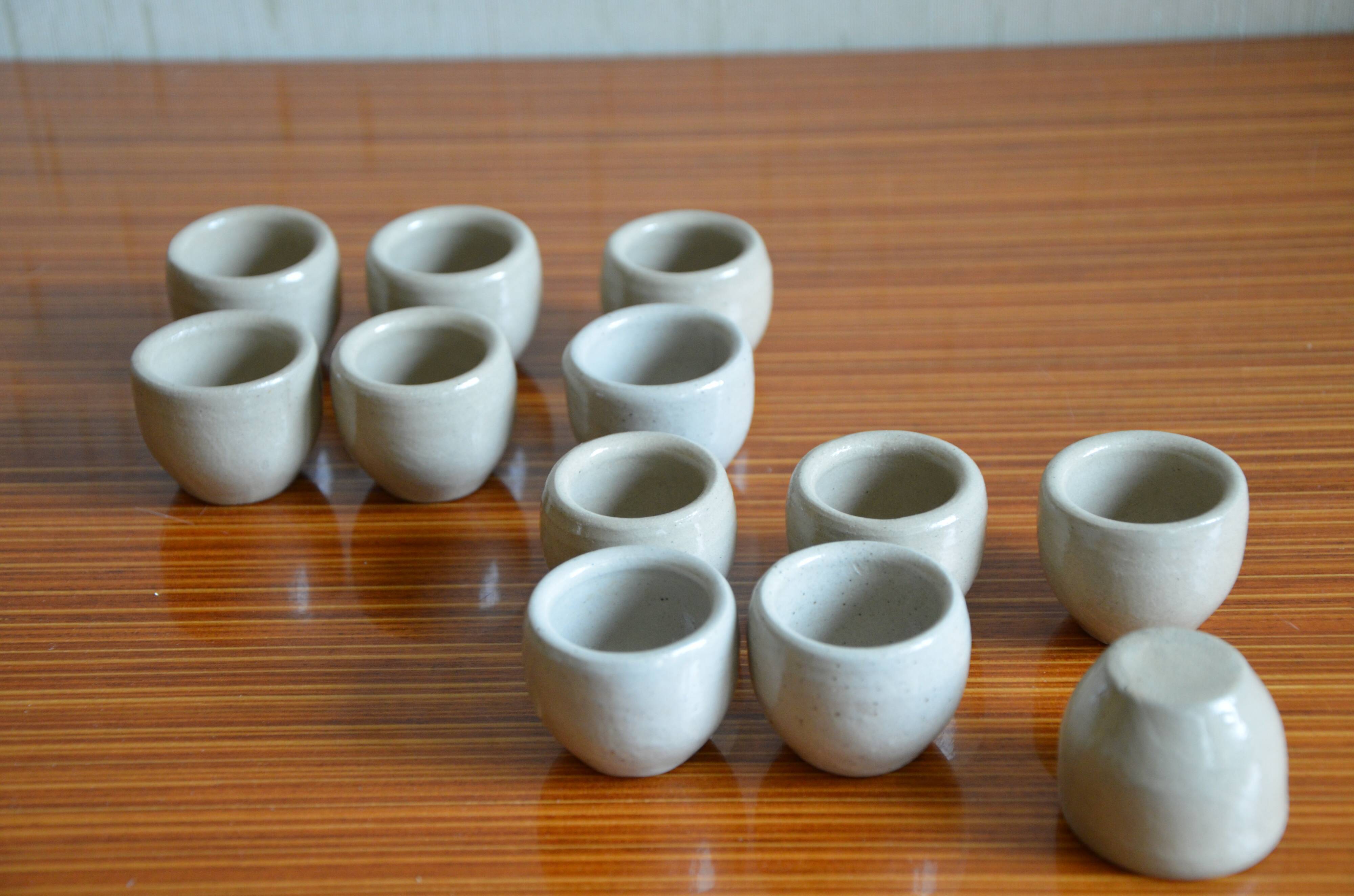 Lot of 12 grey sandstone snail buckets