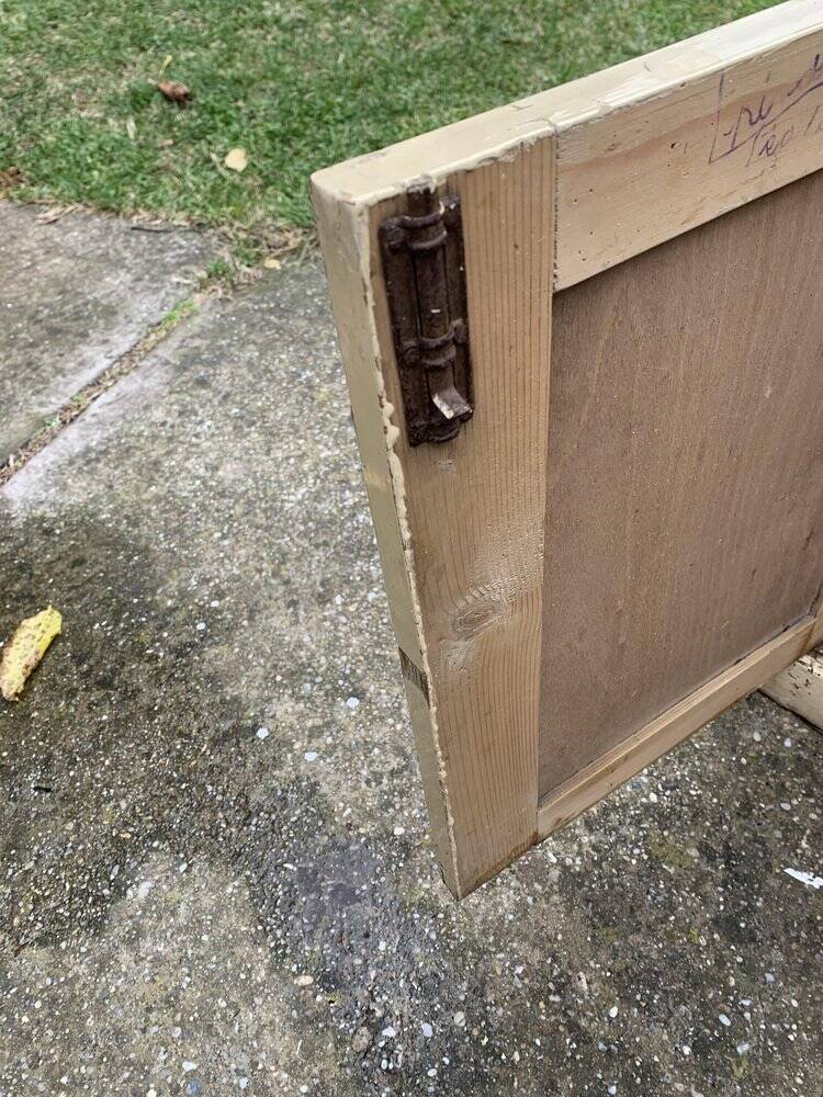 Small vintage yellow bench made of hand-painted wood, low storage from the 1920s.